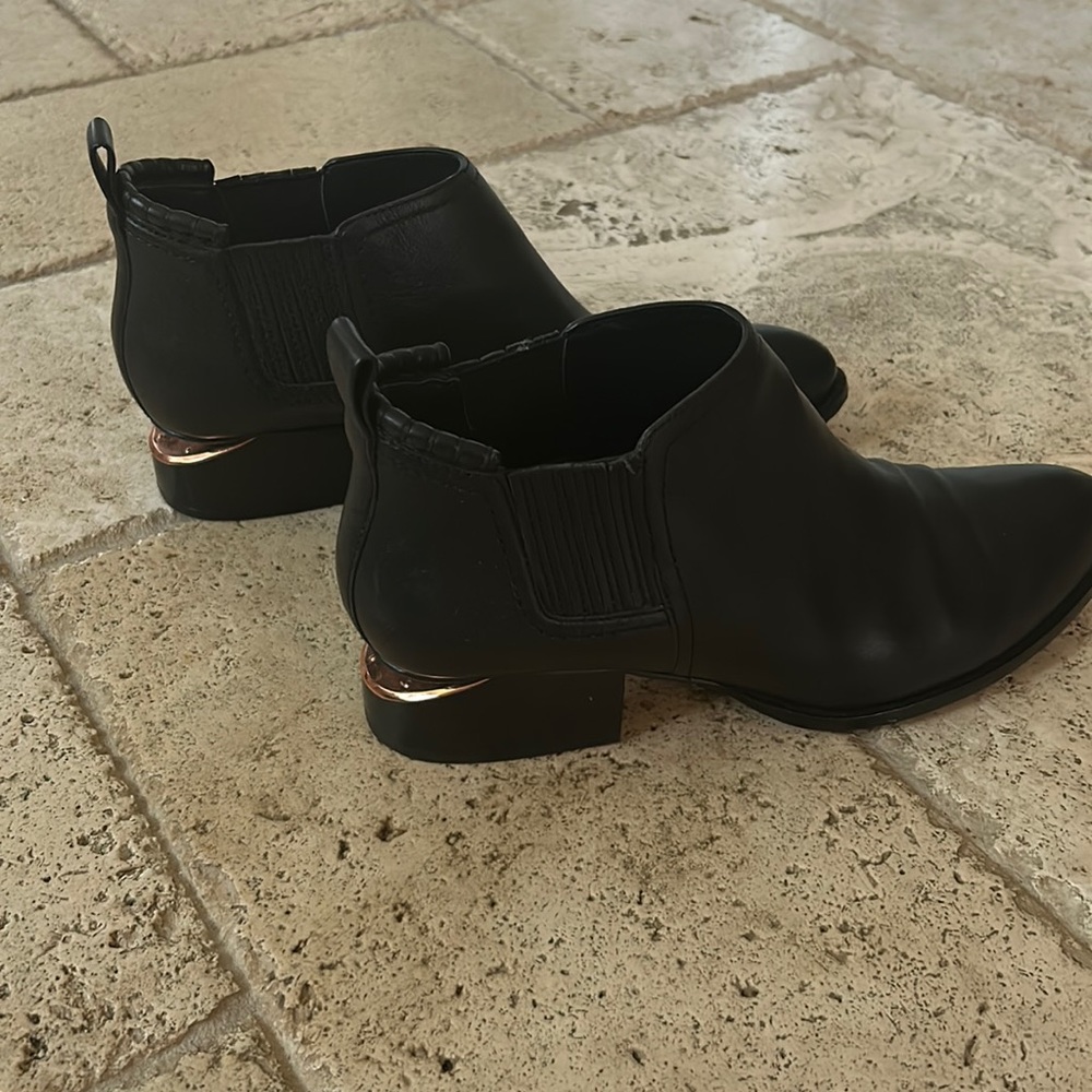 Alexander Wang Kori ankle booties with rose gold cut in black leather